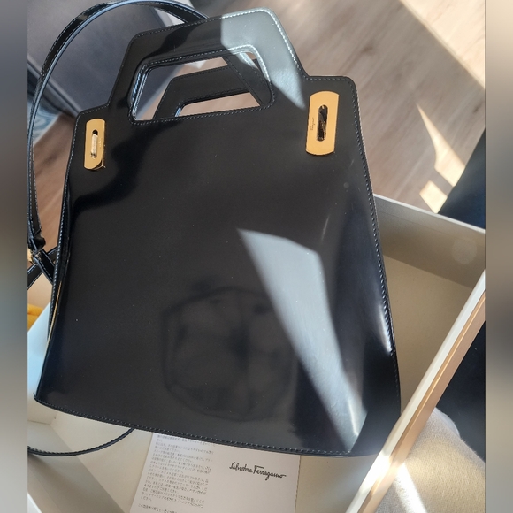 Salvatore Ferragamo Black Leather and Gold Lock Accents Handbag - Picture 2 of 15